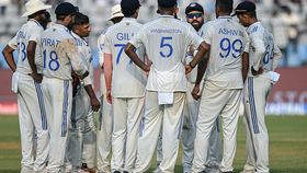 India's captain Rohit Sharma (3R) speaks to his teammates in a drinks break during the second day of the third Test against New Zealand India's captain Rohit Sharma (3R) speaks to his teammates in a drinks break during the second day of the third Test against New Zealand