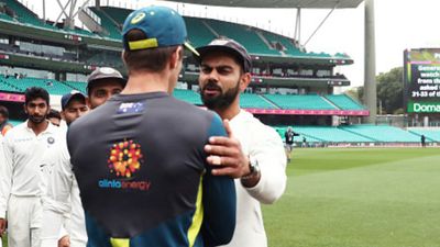 Border-Gavaskar Trophy: Australia announce coaching staff for clash against India after Perth Test, former captain appointed head coach Former Australia captain Tim Paine (left) shakes hands with India's Virat Kohli