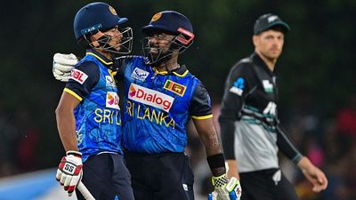 SL vs NZ: Asalanka-Hasaranga rescue Sri Lanka from 87/5 to notch thrilling 4-wicket win against New Zealand in low-scoring 1st T20I Sri Lanka's Dunith Wellalage (L) and captain Charith Asalanka celebrate after Sri Lanka won by 4 wickets during the first T20I against New Zealand on November 9