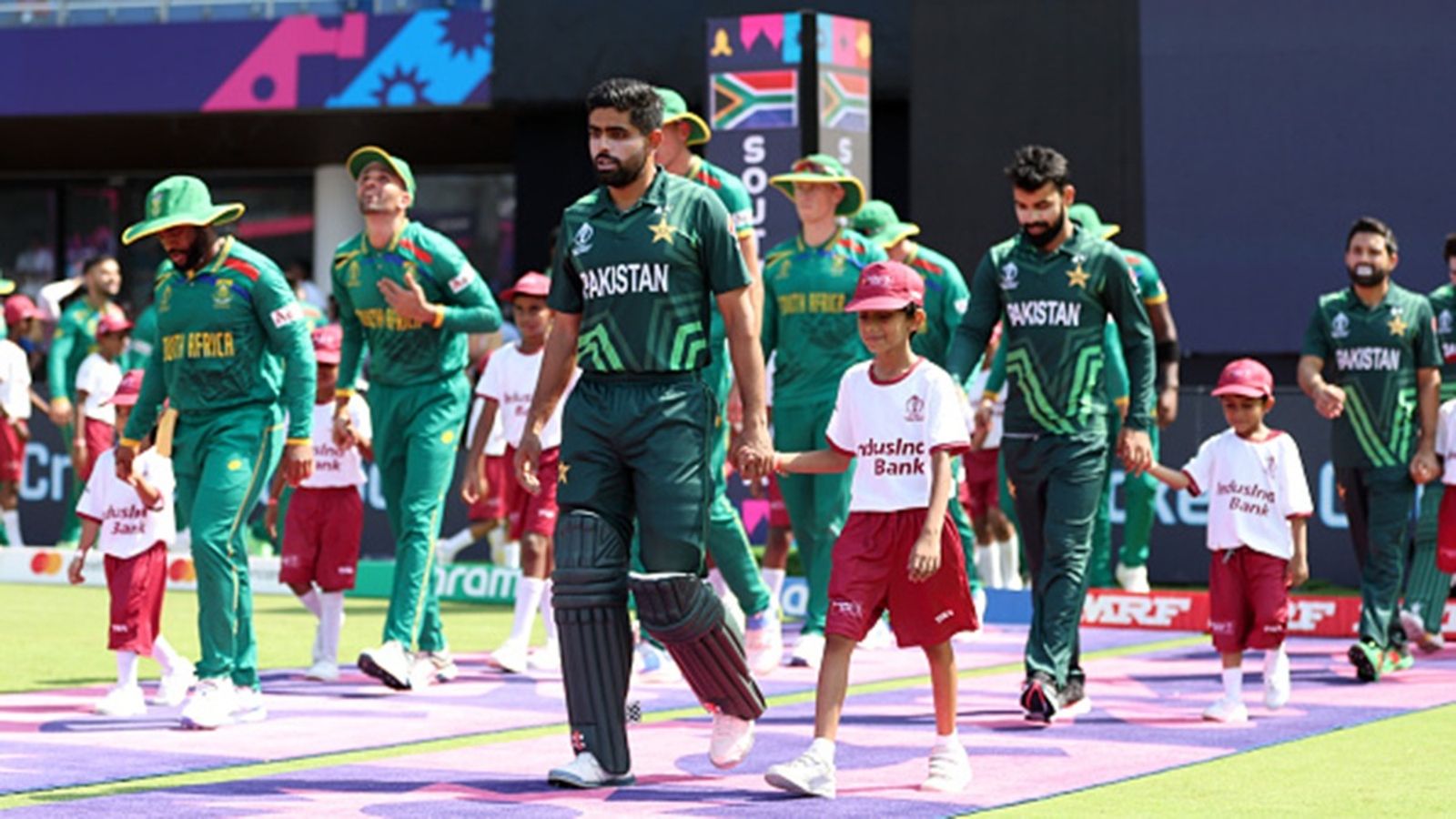 Champions Trophy 2025 to be shifted to South Africa if PCB doesn't agree to ICC's suggestion Temba Bavuma of South Africa and Babar Azam of Pakistan make their way out for the National Anthems ahead of the ICC Men's Cricket World Cup India 2023 between Pakistan and South Africa at MA Chidambaram Stadium on October 27, 2023 in Chennai, India.