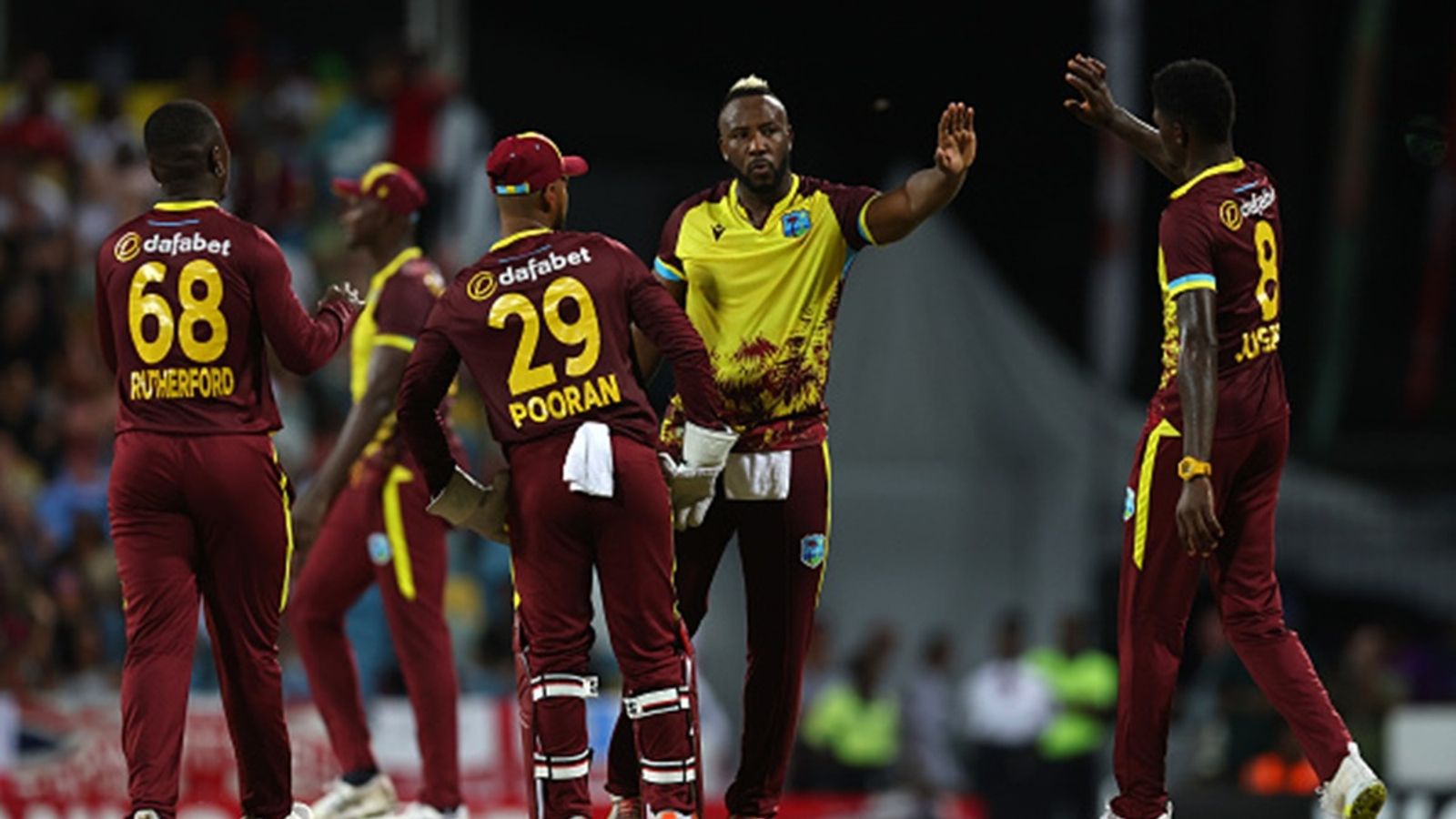 West Indies announce squad for remaining T20Is against England; star all-rounder ruled out due to injury whereas suspended pacer returns Andre Russell (C) of West Indies celebrates with teammates after getting the wicket of Liam Livingstone of England during the 1st T20I against England at Kensington Oval.