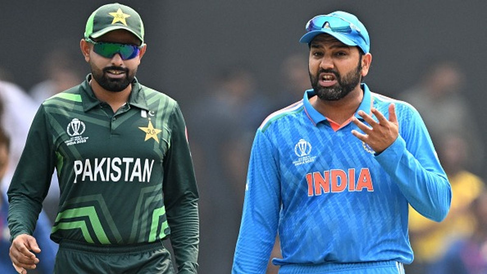 REVEALED: How moving Champions Trophy 2025 out of Pakistan could be a Multimillion-Dollar jolt for PCB, here's detailed breakdown India's captain Rohit Sharma (R) talks with former Pakistan's skipper Babar Azam