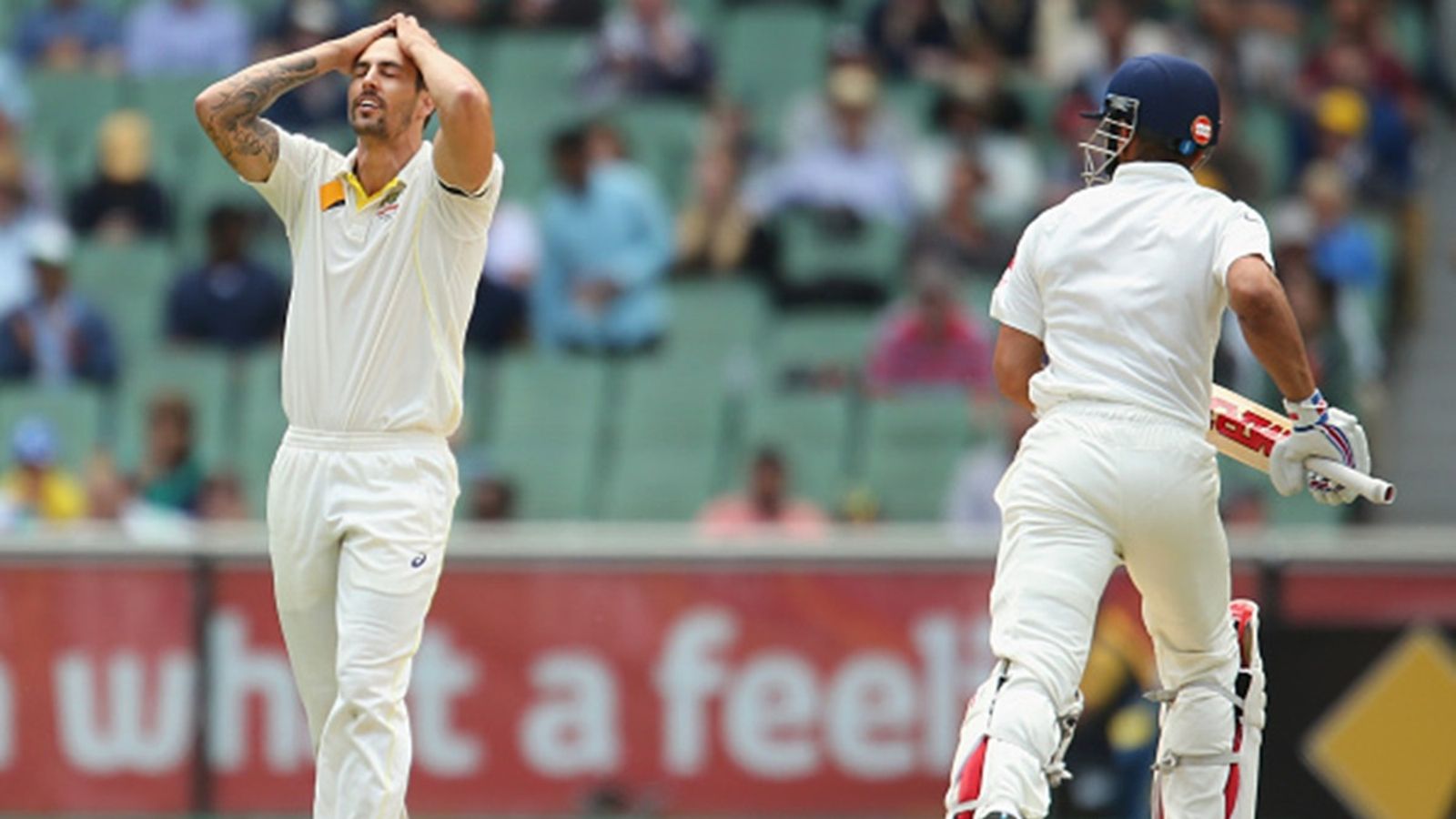 'Maybe I'd like to see him make one more Test ton in Australia': Mitchell Johnson recalls decade-old battle with 'aggressive' Virat Kohli Mitchell Johnson of Australia reacts after being hit for a boundary by Virat Kohli (R) of India during day five of the Third Test match between Australia and India at Melbourne Cricket Ground on December 30, 2014.