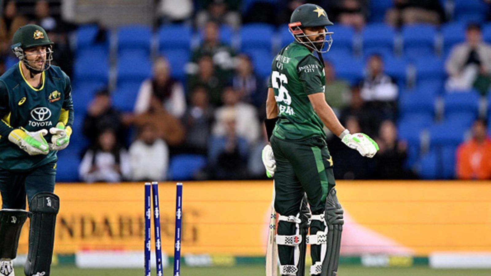 'Batsmen's brainless approach still stuck in Stone Age. Too much running between wickets': Pakistan opener lashes out after T20I whitewash vs Australia Pakistan batsman Babar Azam (R) reacts after being bowled during the third T20I against Pakistan at the Bellerive Oval in Hobart on November 18, 2024.
