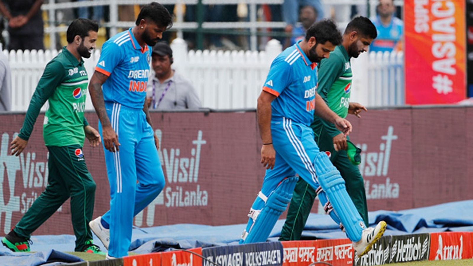 India vs Pakistan group stage match to Champions Trophy 2025 without Pakistan: All key points set to be discussed in ICC's emergency meeting next week Babar Azam captain of Pakistan (R) Rohit Sharma captain of India (2R) /Hardik Pandya (C) and Mohammad Rizwan during the Asia Cup Super Four match at R. Premadasa Stadium on September 10, 2023 in Colombo, Sri Lanka.
