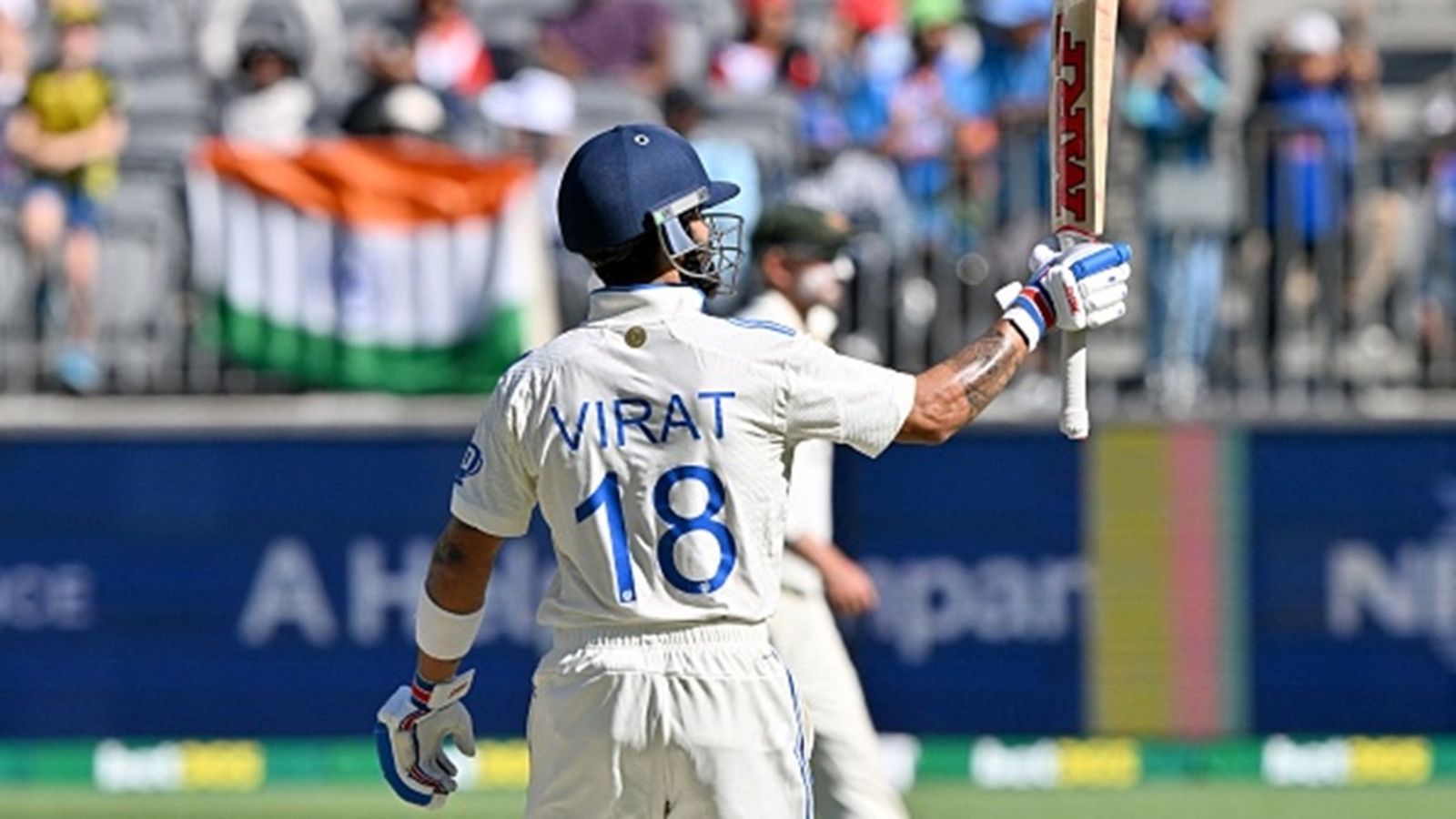 Virat Kohli breaks Sachin Tendulkar's record, equals England legend's 77-year-old feat with 7th Test century on Australian soil India's Virat Kohli gestures towards his wife Anushka Sharma in the stands as he celebrates reaching his half-century in Perth Test.