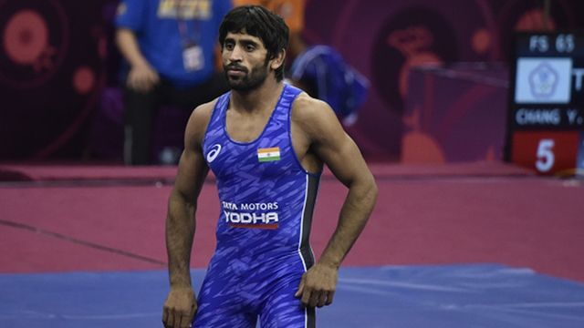 Tokyo Olympics bronze medallist Bajrang Punia slapped with 4-year sunspension by NADA for violating anti-doping code Indian wrestler Bajrang Punia (in blue) during a bout with Dzhamshed Sharifov of Tajikistan during the Senior Asian Wrestling Championship, at IGI Stadium, on February 22, 2020 in New Delhi.