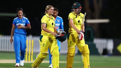 IND vs AUS: India suffer five-wicket thrashing against Australia after Megan Schutt's fiery fifer bowled them out for mere 100 runs Australia's Georgia Voll and Tahlia McGrath leave the field after beating India by 5 wickets in first ODI