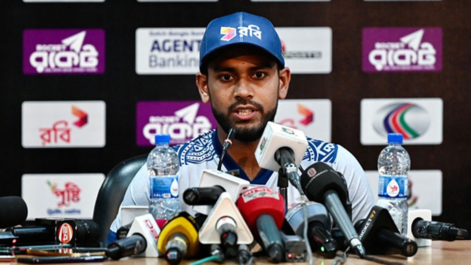 'The century was not an issue for me': Bangladesh captain responds to criticism over 74-run knock with 73 strike rate vs West Indies Bangladesh's Mehidy Hasan Miraz speaks during a press conference at the Zahur Ahmed Chowdhury Stadium in Chittagong on March 17, 2024.