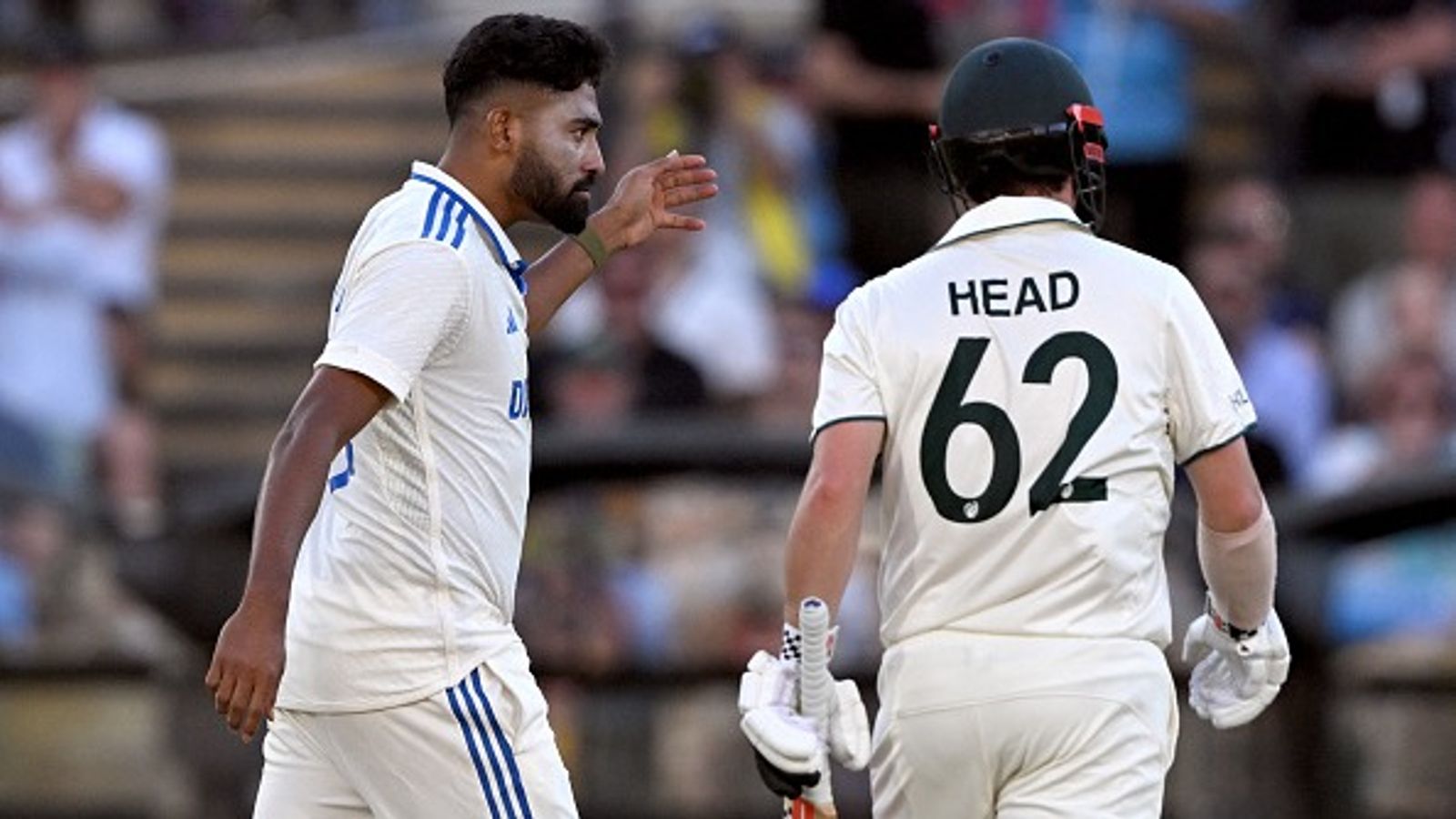 Big News: ICC slaps Mohammed Siraj with hefty fine over heated spat in Adelaide Test while Travis Head escapes big punishment and treated differently, here's why India's pacer Mohammed Siraj (L) gestures to Australian batter Travis Head (R) in frame