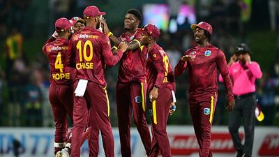 ICC comes up with big punishment for West Indies star after ugly spat with fourth umpire during 1st ODI against the Bangladesh West Indies' Alzarri Joseph (C) celebrates with teammates in this frame