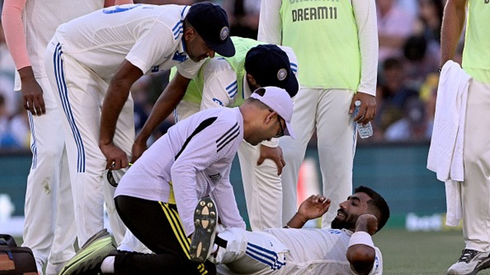 'Give Jasprit Bumrah break in..bilaterals we forget 48 hours later': Sanjay Manjrekar turns down workload concerns for Border-Gavaskar Trophy matches Indian bowler Jasprit Bumrah (R) attended by physios on Day 2 of 2nd Test against Australia