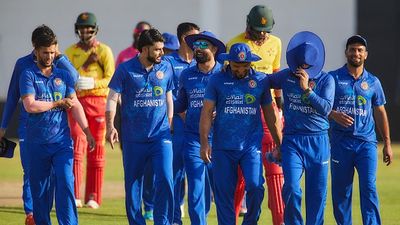 Rashid Khan's fiery 4-fer, Nabi's late blitz power Afghanistan to series win over Zimbabwe with 3-wicket victory in low-scoring 3rd T20I Afghanistan players walk off the field after their victory during the 3rd T20I against Zimbabwe