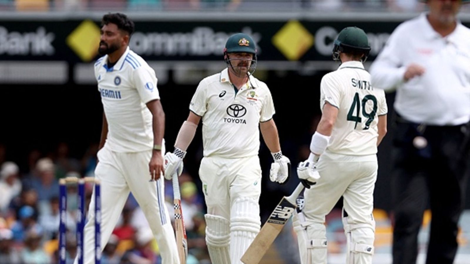 'Dumb cricket': Ex-Australia opener tears into Mohammed Siraj and Rohit Sharma's clueless field placement after Travis Head uppercuts him for boundary India's Mohammed Siraj (L) reacts after Australia's Travis Head (C) celebrates with teammate Steve Smith after hitting a boundary on day two of the third cricket Test match between Australia and India at The Gabba in Brisbane on December 15, 2024.