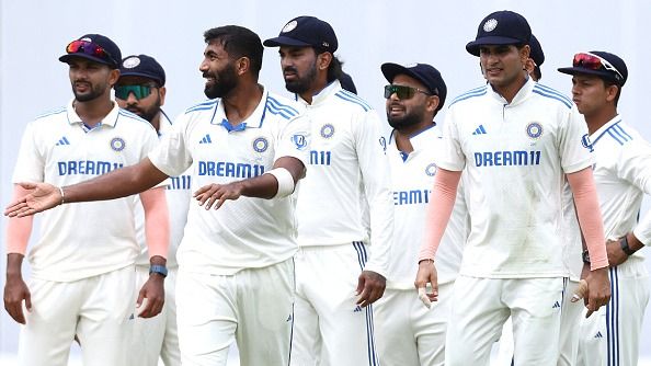 'We don’t want to get into mindset where we are pointing fingers at...': Jasprit Bumrah openly defends under-fire Team India amidst Gabba Test India's Jasprit Bumrah (C) celebrates the wicket of Australia's Mitchell Starc with his teammates on Day 3 of the third Test