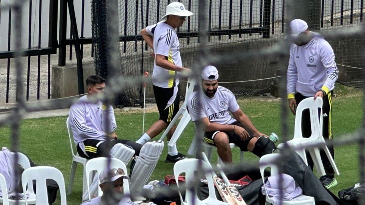 Injury scare for India ahead of Boxing Day Test: Rohit Sharma hit on knee by throwdown speciallist while batting in nets, physio rushes to aid Rohit Sharma gets medical attention after taking a blow to the knee while batting in the nets.