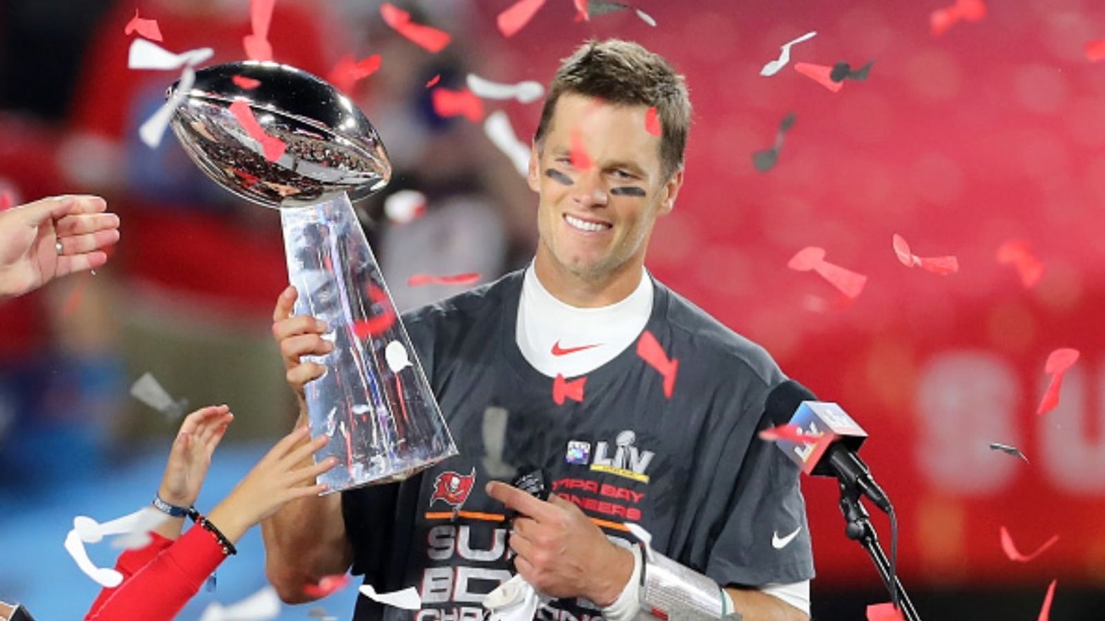 NFL Throwback: Flashback to Tom Brady throwing the Vince Lombardi Trophy Tom Brady in the frame