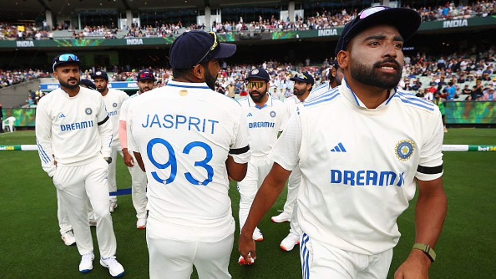 Why are Rohit Sharma, Virat Kohli and other Team India players wearing black armbands on Day 2 of Boxing Day Test? Explained Why are Rohit Sharma, Virat Kohli and other Team India players wearing black armbands on Day 2 of Boxing Day Test? Explained