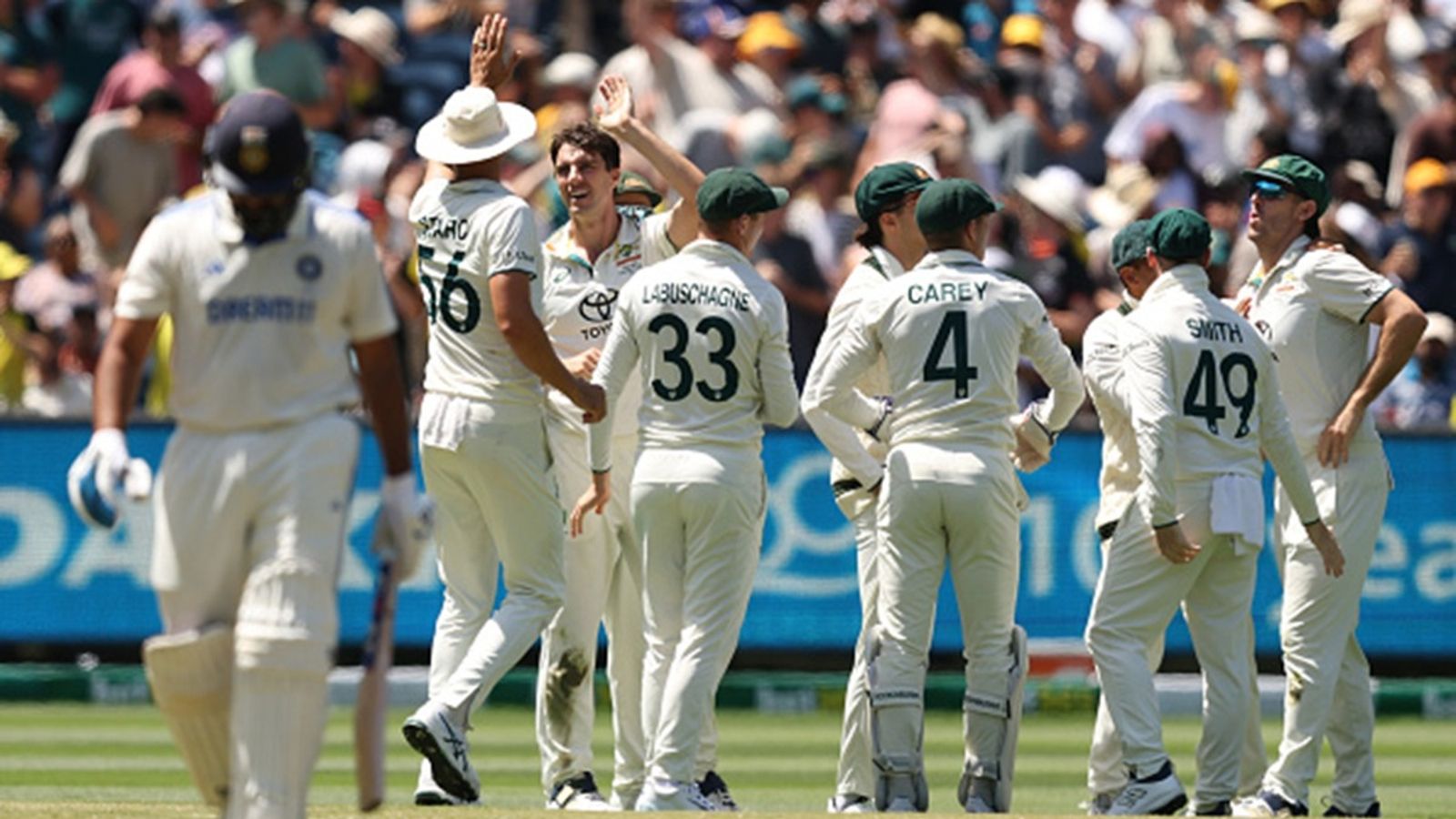 Pat Cummins' double wicket-maiden pushes India on back foot in mammoth run chase of 340, Virat Kohli's offside issue continues Pat Cummins of Australia celebrates the wicket of Rohit Sharma of India during day five of the Men's Fourth Test Match in the series between Australia and India at Melbourne Cricket Ground on December 30, 2024 in Melbourne, Australia.