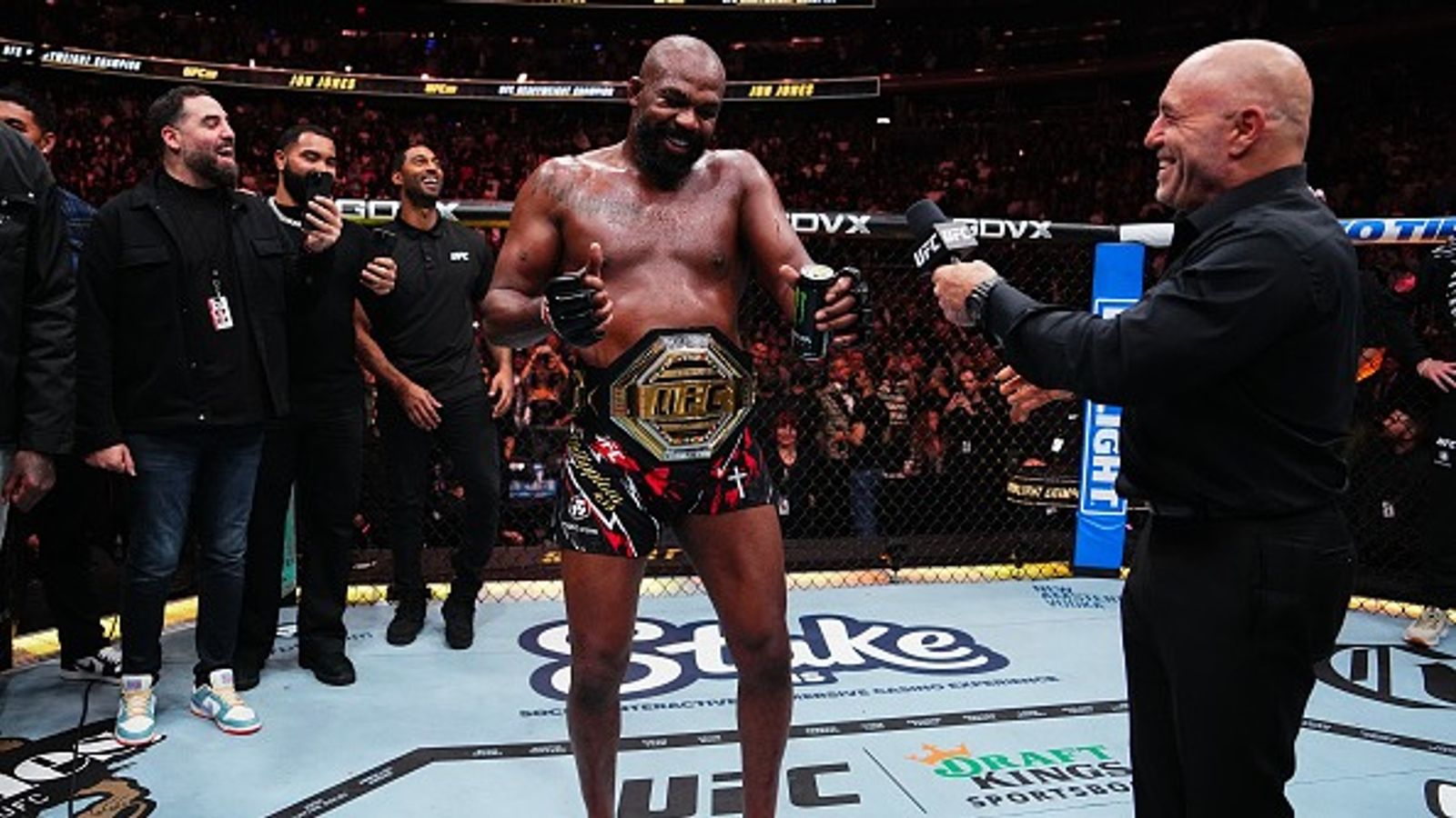 Joe Rogan Reveals Shocking Figure UFC Must Pay Jon Jones to Face Tom Aspinall, 'The rumor is that he wants...' Jon Jones and Joe Rogan in the frame.