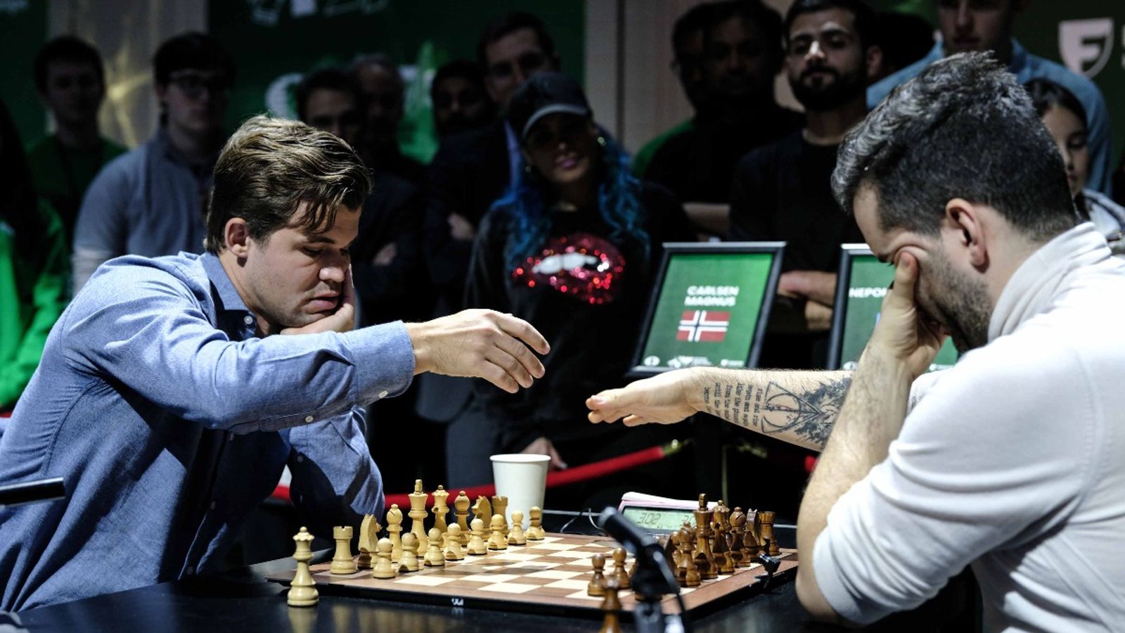 Controversial American Grandmaster Launches Scathing Attack on Magnus Carlsen Alleging Him For Planning 'Prearranged Draw' With Ian Nepomniachtchi In World Rapid Championship, 'You broke the rules on camera' Magnus Carlsen and Ian Nepomniachtchi shared the World Blitz Championship title (Getty Images)
