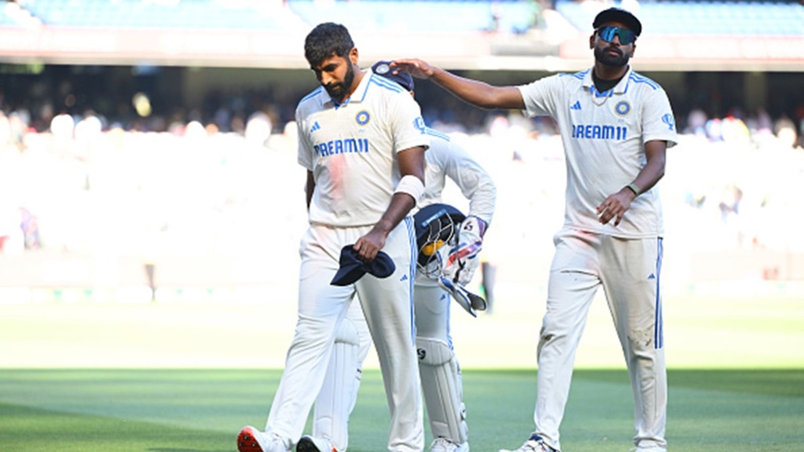 India's World Cup-winning pacer says 'workload management is bull****' after Jasprit Bumrah gets injured, tells pacers to leave Test cricket if they can't bowl 20 overs in an innings Jasprit Bumrah and Mohammed Siraj of India leave the field at the end of play on day four of the Men's Fourth Test Match in the series against Australia Melbourne Cricket Ground on December 29, 2024.