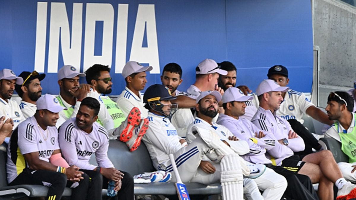Indian players to face pay-cut based on their performance? Corporate-like variable pay discussed in BCCI's review meeting: Report India's skipper Rohit Sharma (C) sits in the dugout with teammates during the tour cricket match between the Australian Prime Minister's XI and India at Manuka Oval in Canberra on December 1, 2024.