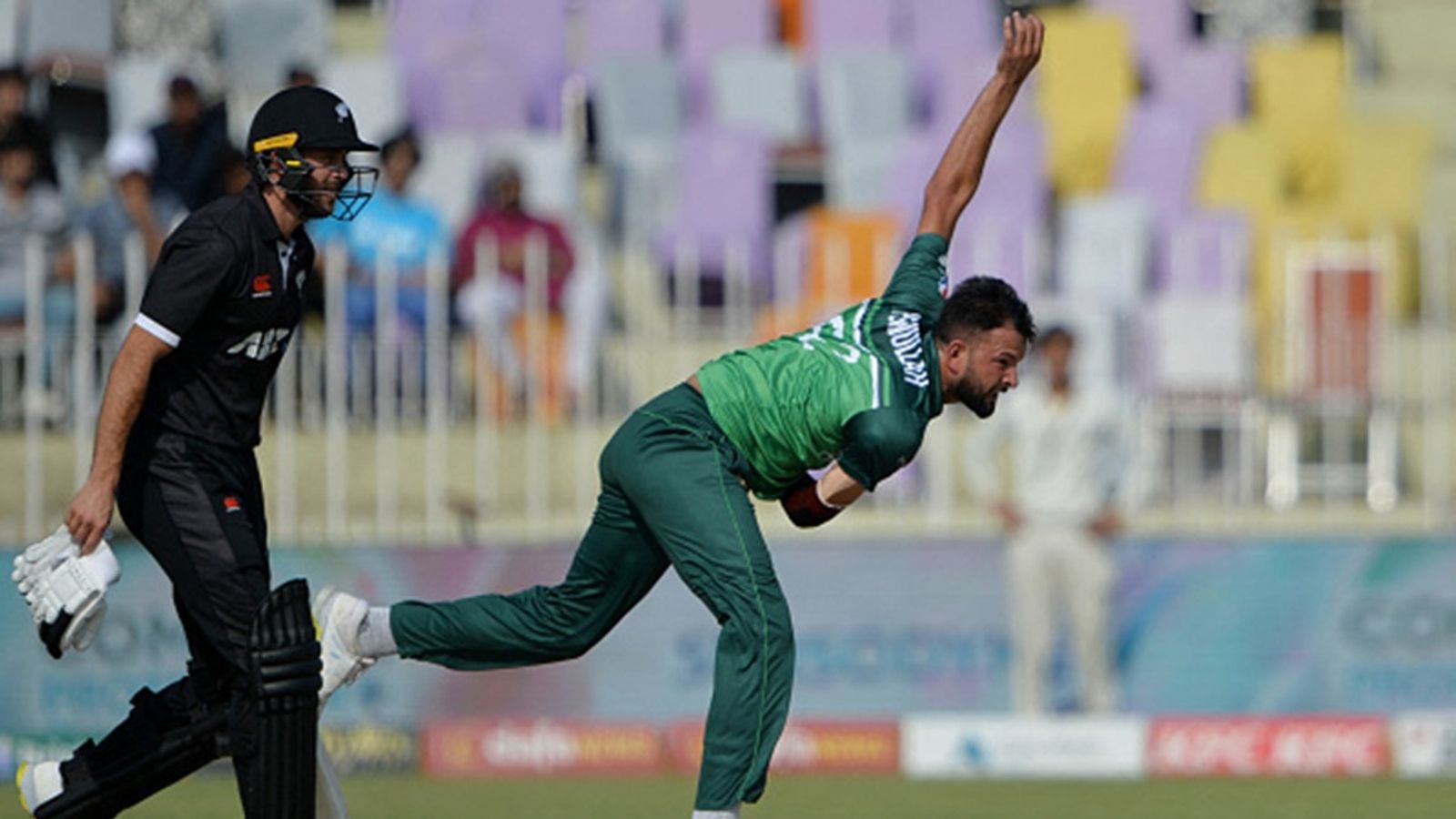 'I completely boycott and retire from PSL... I'll bowl at a pace of 150-160': Frustrated Pakistan young pacer's strong retort to draft pick snub Pakistan's Ihsanullah (R) bowls during the second one-day international (ODI) cricket match between Pakistan and New Zealand at the Rawalpindi Cricket Stadium on April 29, 2023.