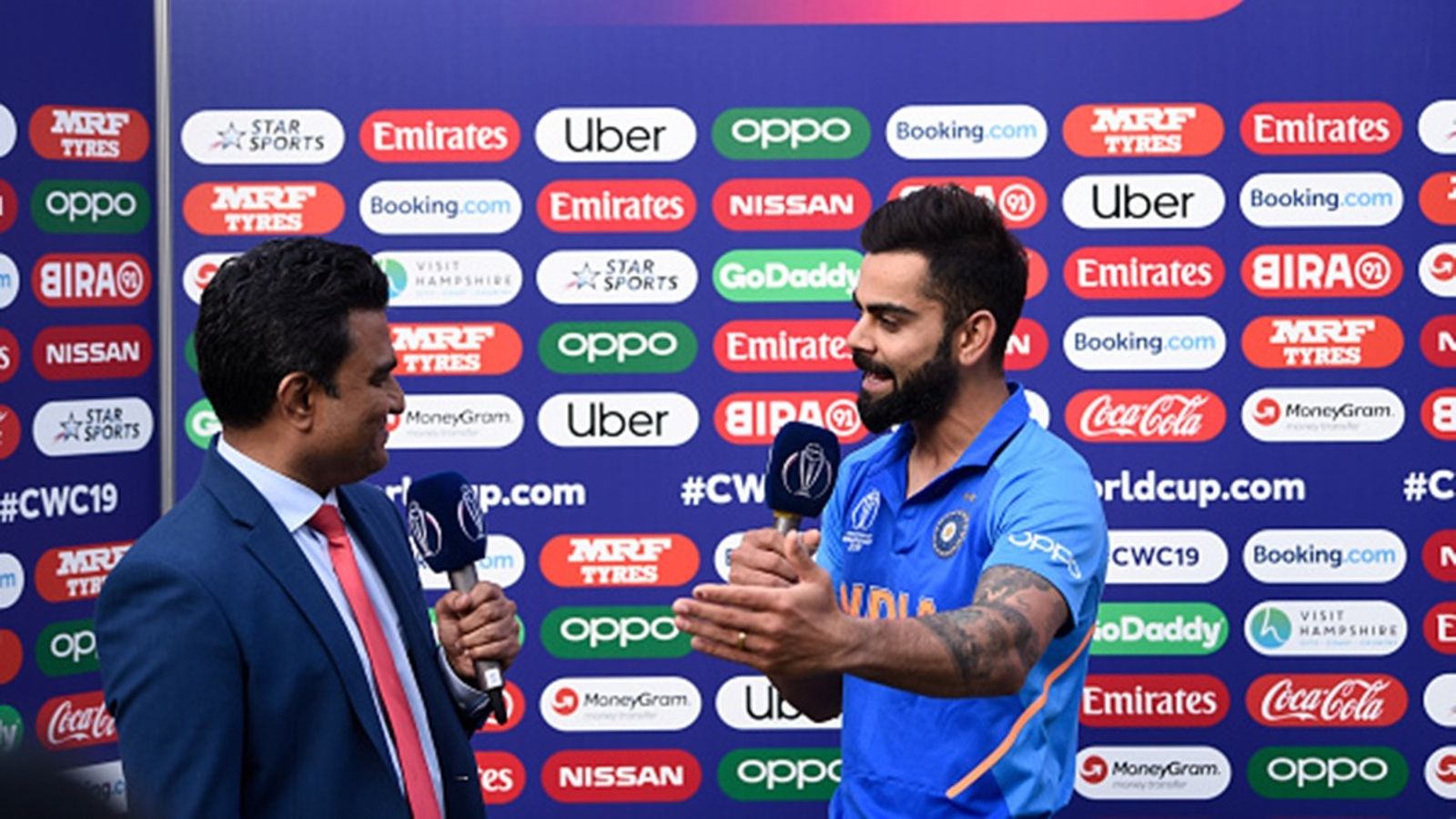 Sanjay Manjrekar makes unrealistic county cricket demand from Virat Kohli before he plays Test series in England, says ' could be a versy sensible move' India captain Virat Kohli speaks to commentator Sanjay Manjrekar after the Group Stage match of the ICC Cricket World Cup 2019 between South Africa and India at The Ageas Bowl on June 05, 2019.