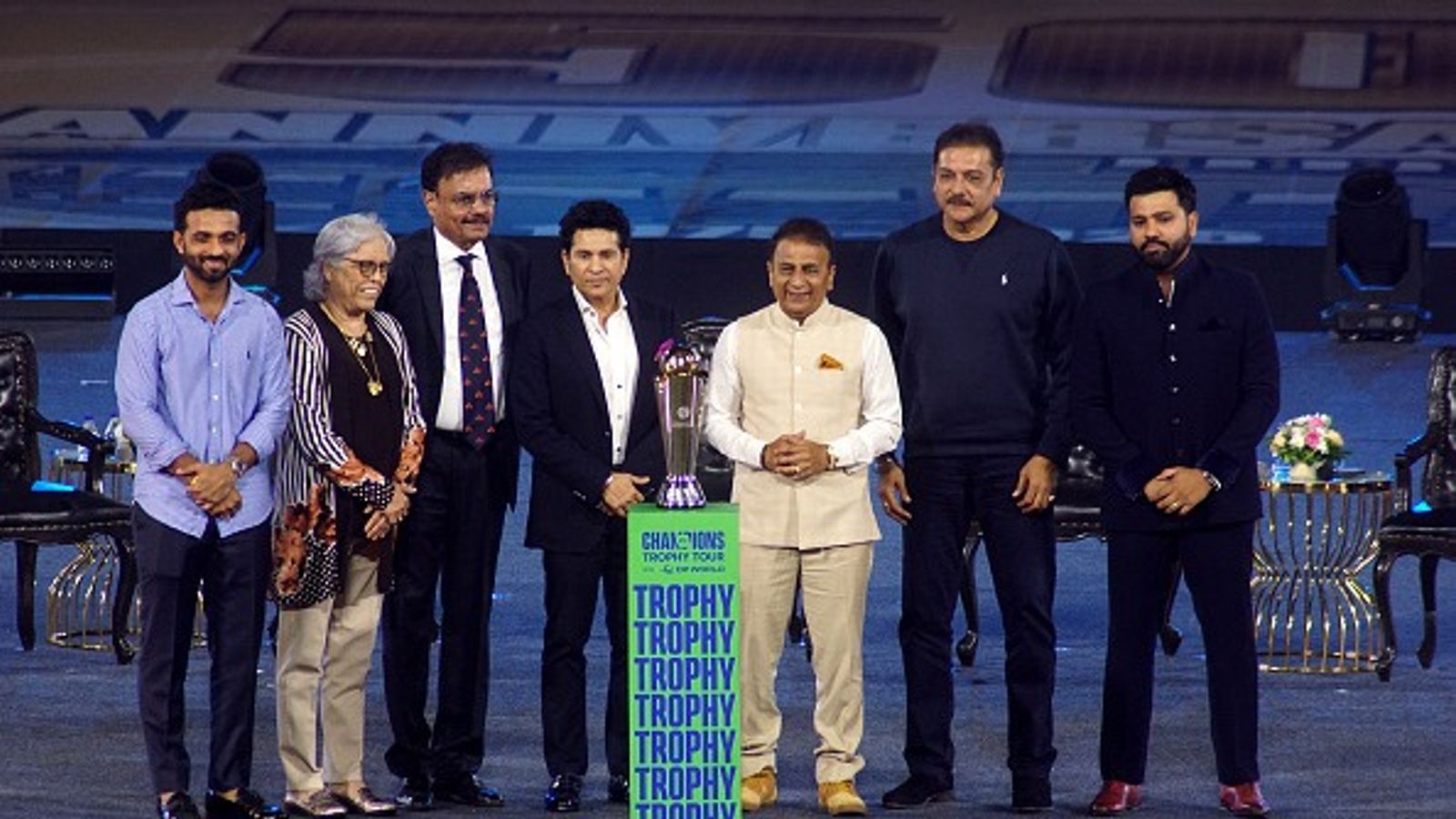 Rohit Sharma poses with coveted Champions Trophy during Wankhede Stadium ceremony alongwith Sachin Tendulkar, Sunil Gavaskar and other legends - WATCH Rohit Sharma poses with coveted Champions Trophy during Wankhede Stadium ceremony alongwith Sachin Tendulkar, Sunil Gavaskar and other legends - WATCH
