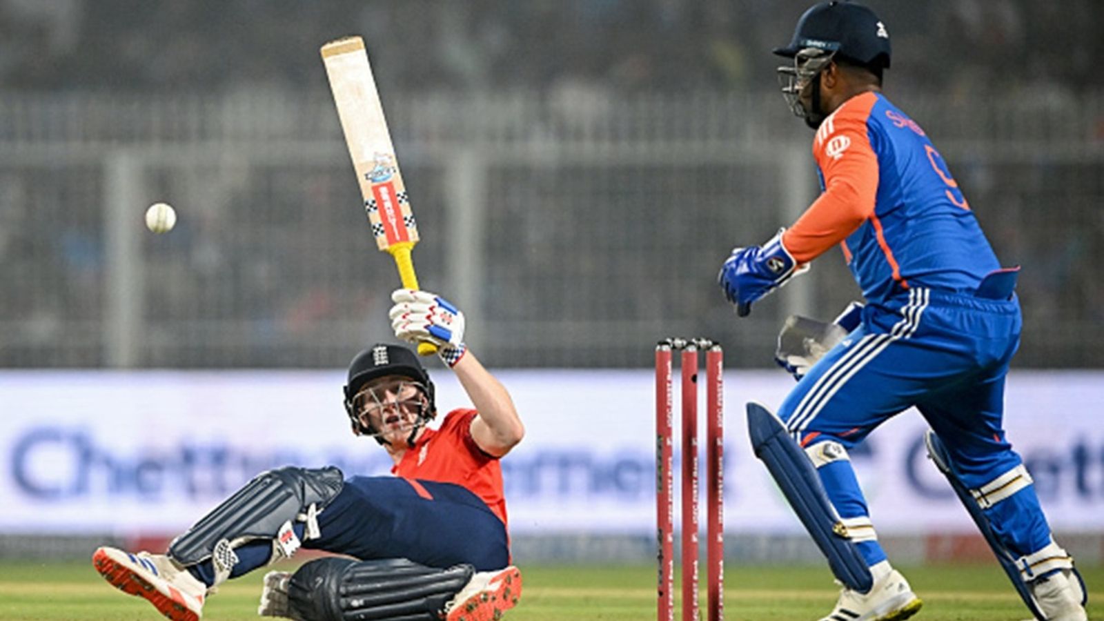 Harry Brook blames smog for trouble against spinners in Kolkata, says 'Hopefully, the air is a bit clearer here' England's Harry Brook (L) falls while playing a shot as India's wicketkeeper Sanju Samson watches during the first T20I between India and England at the Eden Gardens in Kolkata on January 22, 2025.