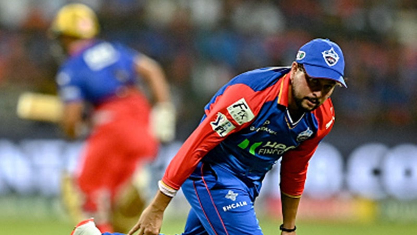 Kuldeep Yadav asks RCB fans to 'chill' after hilarious jibe, says 'Trophy apki hai. Par me goalkeeper ni hu' Delhi Capitals' Kuldeep Yadav fields the ball during the IPL 2025 clash against Royal Challengers Bengaluru at the M Chinnaswamy Stadium in Bengaluru on May 12, 2024.