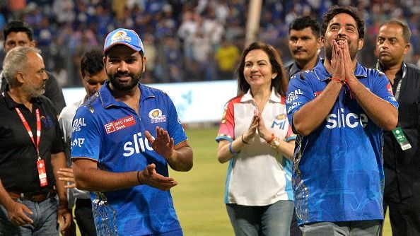 Mumbai Indians owners secure 49% stake in 2-time The Hundred title-winning team ahead of IPL 2025 Nita Ambani (C), the owner of team Mumbai Indians along with her son Akash Ambani (2R) and former captain Rohit Sharma in frame