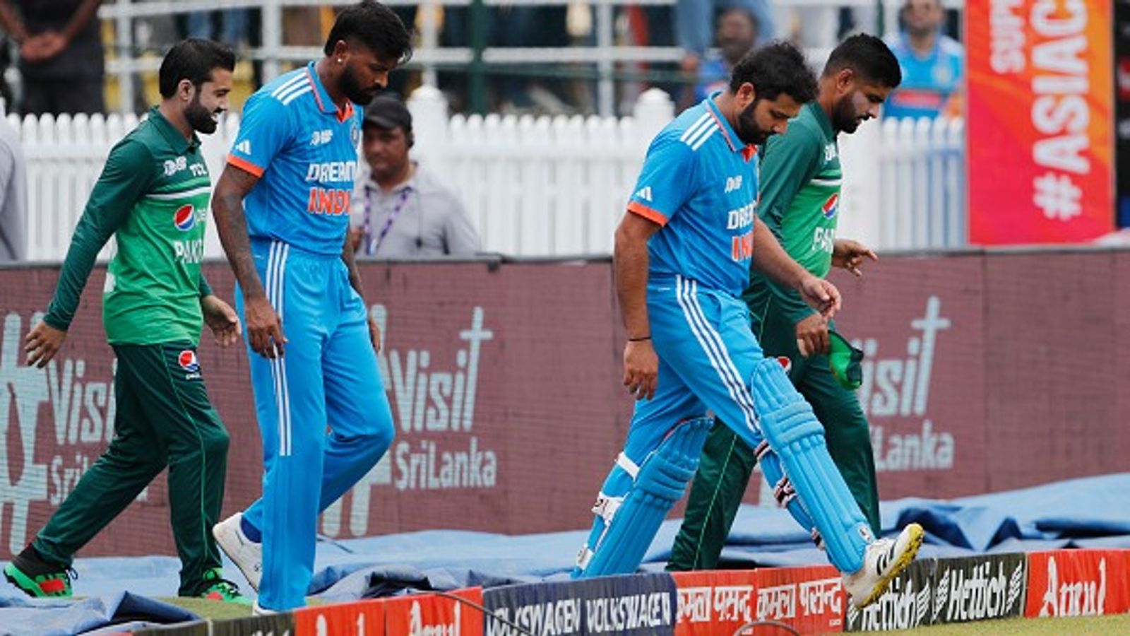 How to buy tickets for India's group-stage ICC Champions Trophy 2025 matches? Ticket sales timings, starting price revealed Pakistan's Babar Azam (R), Mohammad Rizwan (L) and India's Rohit Sharma (2R), Hardik Pandya (C) and Mohammad Rizwan during the Asia Cup Super Four match on September 10, 2023.