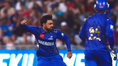 Rashid Khan breaks former CSK all-rounder's all-time record to become highest T20 wicket-taker, dismisses Dinesh Karthik in record-breaking spell Rashid Khan