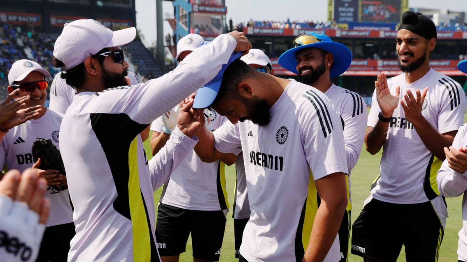 'From tennis ball cricket to T20 cricket, we all have seen...': Ravindra Jadeja hands ODI debut cap to Varun Chakaravarthy, watch VIDEO Ravindra Jadeja giving ODI debut cap to Varun Chakaravarthy