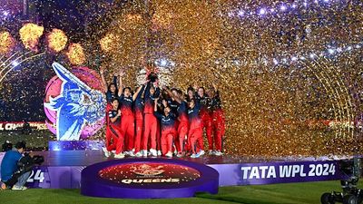 WPL 2025: A look at Women's Premier League 2025's full schedule, venues, format and everything you need to know Royal Challengers Bangalore's players hold the trophy after winning the Women's Premier League (WPL) 2024 title