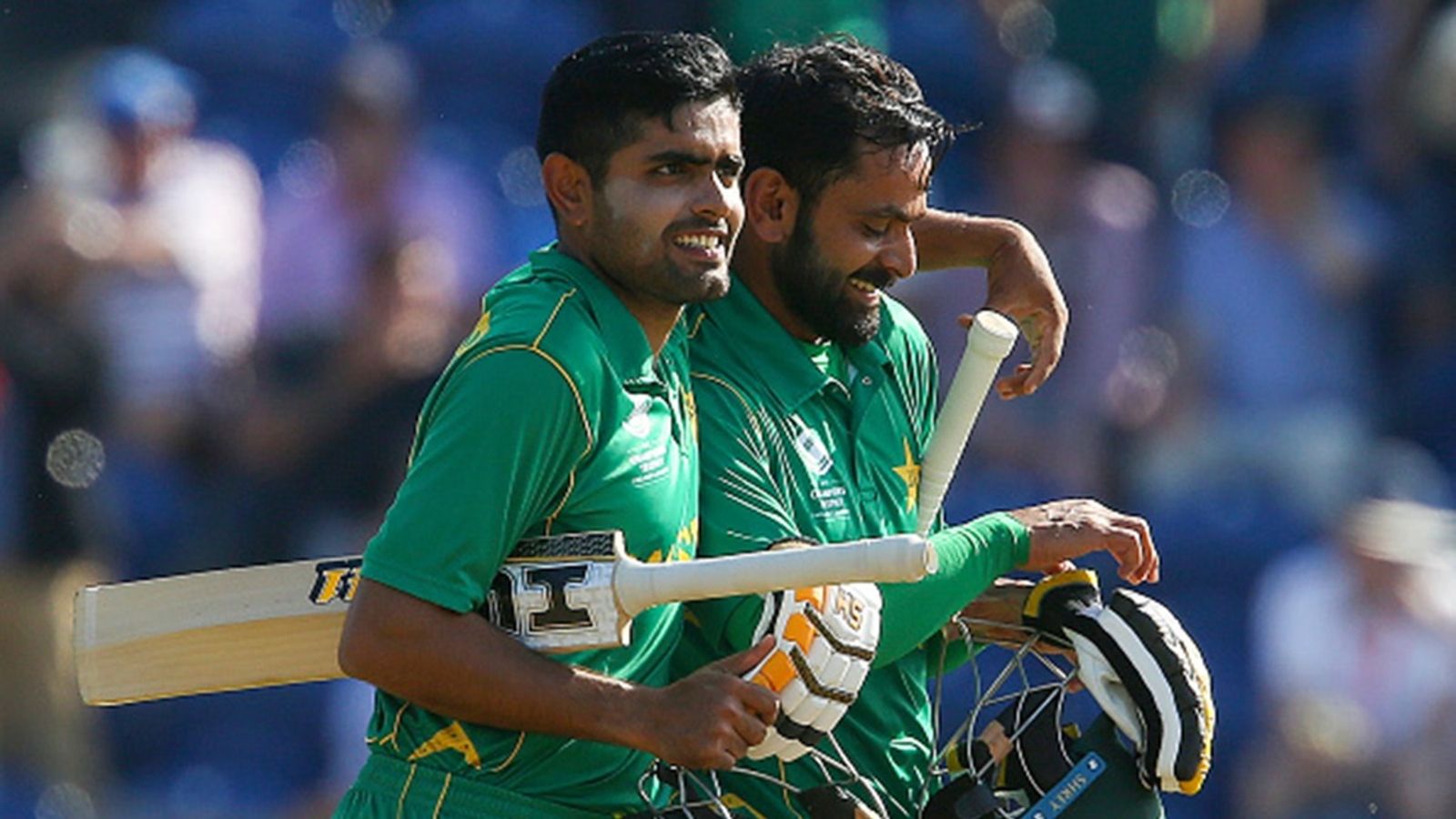 'Get out of your PR machinery. We need a performer': Mohammad Hafeez rips apart 'not the true king' Babar Azam for not winning a single ODI vs India Pakistan's Mohammad Hafeez (R) and Babar Azam walks back to the pavilion after Pakistan won the ICC Champions Trophy semi-final against England in Cardiff on June 14, 2017.