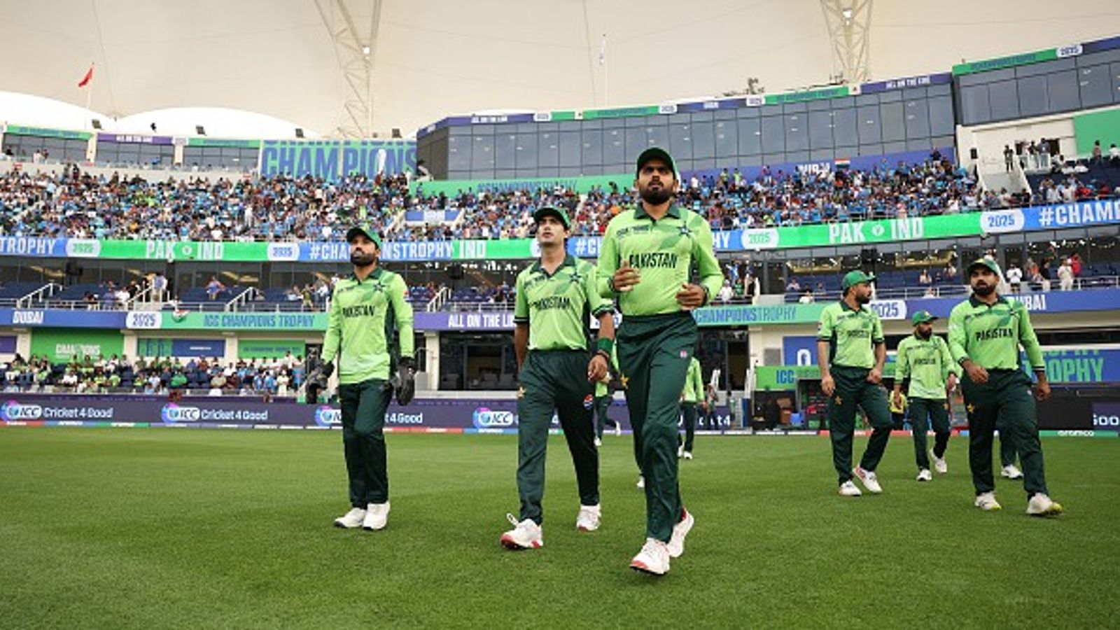 Trouble galore for Pakistan as Prime Minister to personally review Mohammad Rizwan brigade's Champions Trophy fiasco, issue to be raised in Parliament Pakistan's Babar Azam walks out to field with his teammates during their Champions Trophy match against India