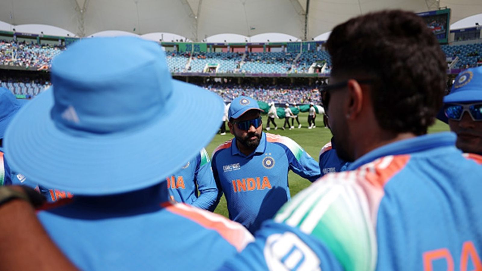 IND vs NZ Playing XI: Rohit Sharma loses toss again, drops Harshit Rana and goes for spin-heavy attack against New Zealand Rohit Sharma of India is seen a huddle during the ICC Champions Trophy 2025 match between Pakistan and India at Dubai International Cricket Stadium on February 23, 2025 in Dubai, United Arab Emirates.