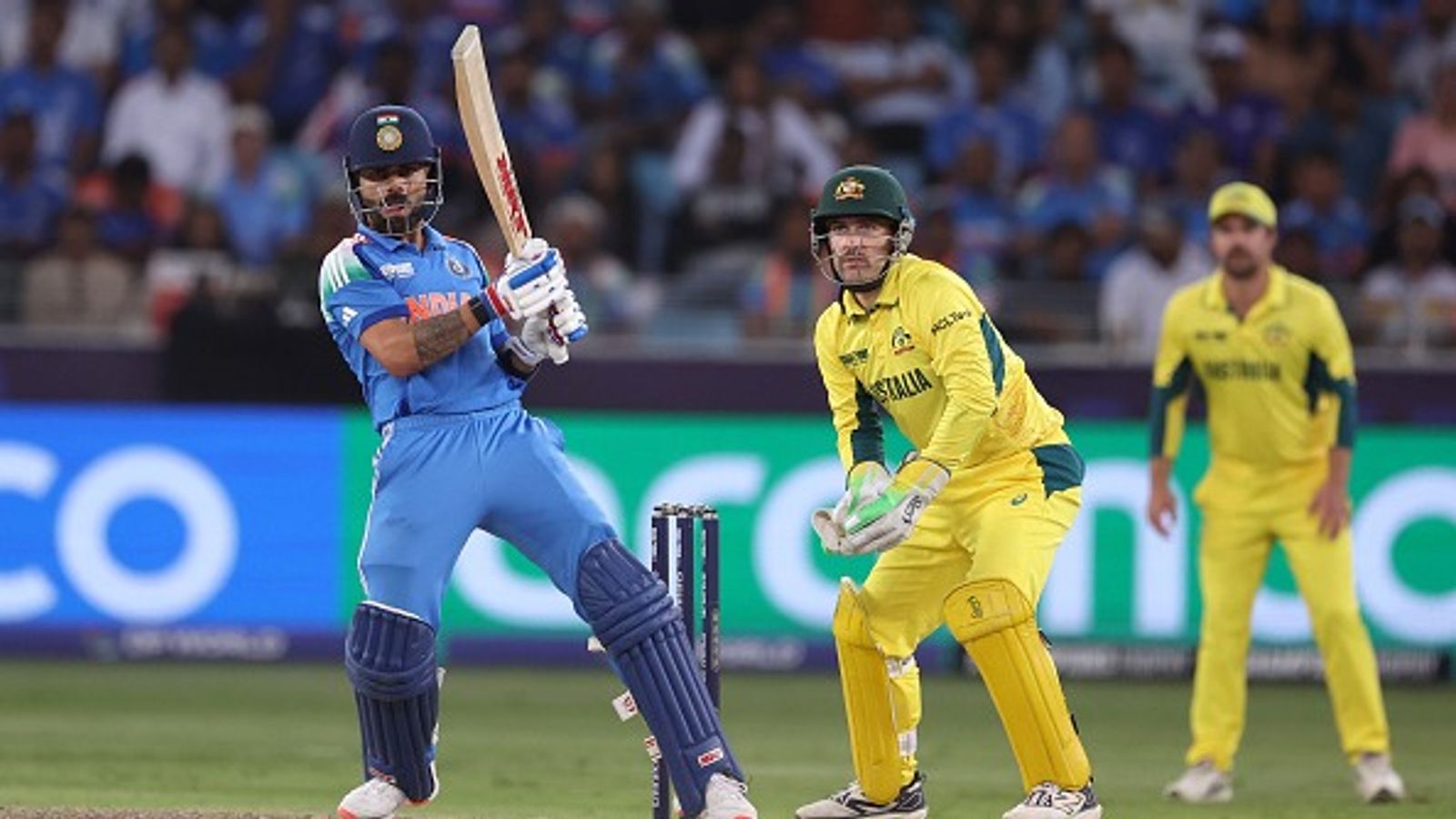 Virat Kohli shatters India's all-time Champions Trophy record with splendid fifty during clash against Australia India's Virat Kohli bats as Australia wicketkeeper Josh Inglis watches on during their Champions Trophy semifinal