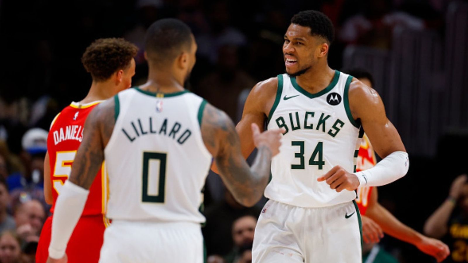 Bucks superstar Giannis Antetokounmpo clocks sensational feat during win over Mavericks Giannis Antetokounmpo and Damian Lillard in the frame