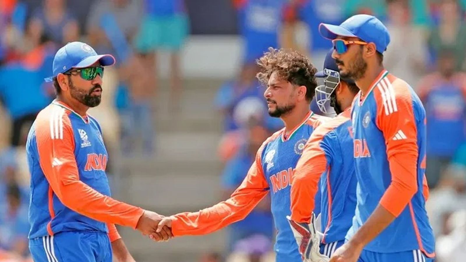 'It's very difficult to manage...': Kuldeep Yadav's big words on Rohit Sharma's captaincy after India's Champions Trophy glory India captain Rohit Sharma (L) shakes hand with Kuldeep Yadav in frame