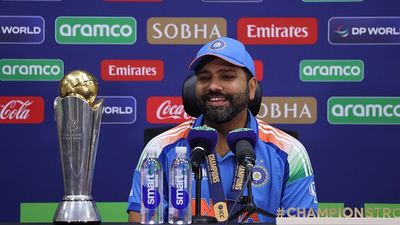 Rohit Sharma forgets ICC Champions Trophy in PC room, Indian captain leaves everyone in splits as video goes viral Indian captain Rohit sharma with Champions Trophy title