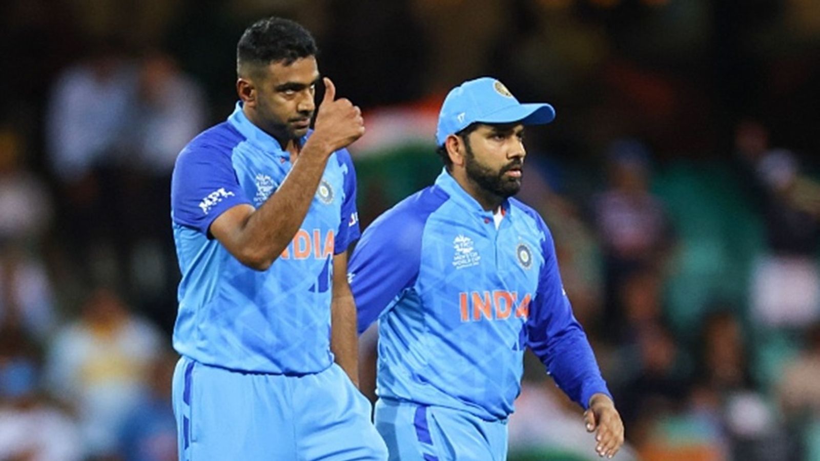 'Earlier top three batters will score big runs, improve their average': R Ashwin believes Rohit Sharma's legacy is not winning tournaments but batting intent India's Ravichandran Ashwin (L) reacts next to India's captain Rohit Sharma after taking a wicket during the ICC men's T20 World Cup 2022 against Netherlands at the Sydney Cricket Ground in Sydney on October 27, 2022.