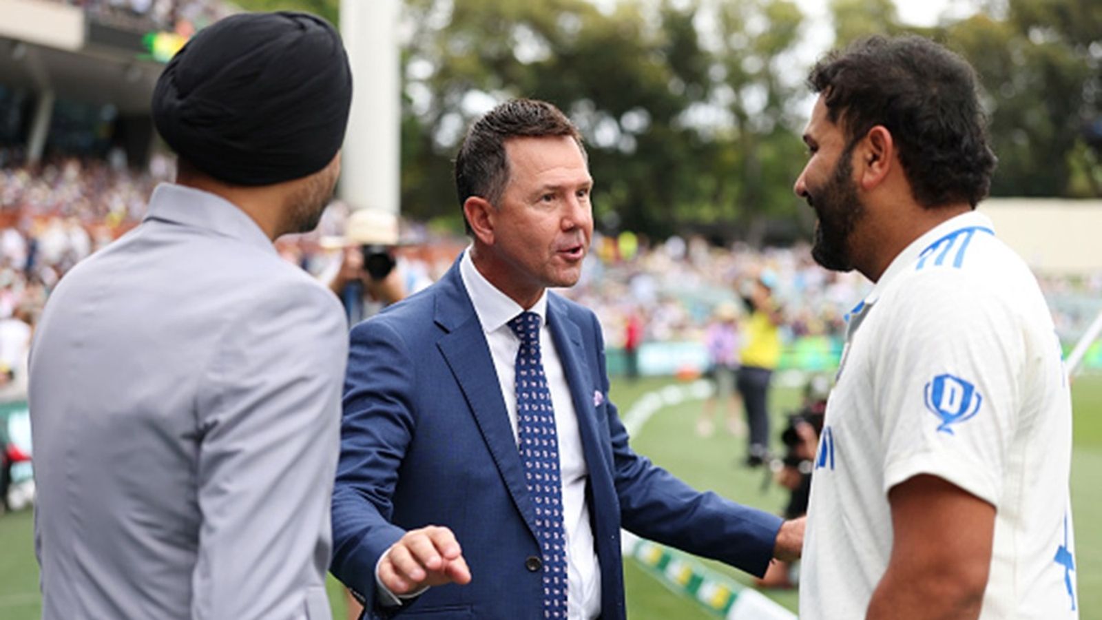 '...everyone's waiting for you to retire': Ricky Ponting guesses the reason behind Rohit Sharma not retiring from ODIs after Champions Trophy 2025 win Ricky Ponting speaks to Harbhajan Singh and Rohit Sharma of India before national anthems prior to day one of the Test at Adelaide Oval on December 06, 2024.