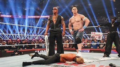 'Gotta just drop the act': Former World Champion Explains How WWE Should Portray John Cena as a Heel Dwayne "The Rock" Johnson, John Cena, and Travis Scott stand over Cody Rhodes during WWE Elimination Chamber