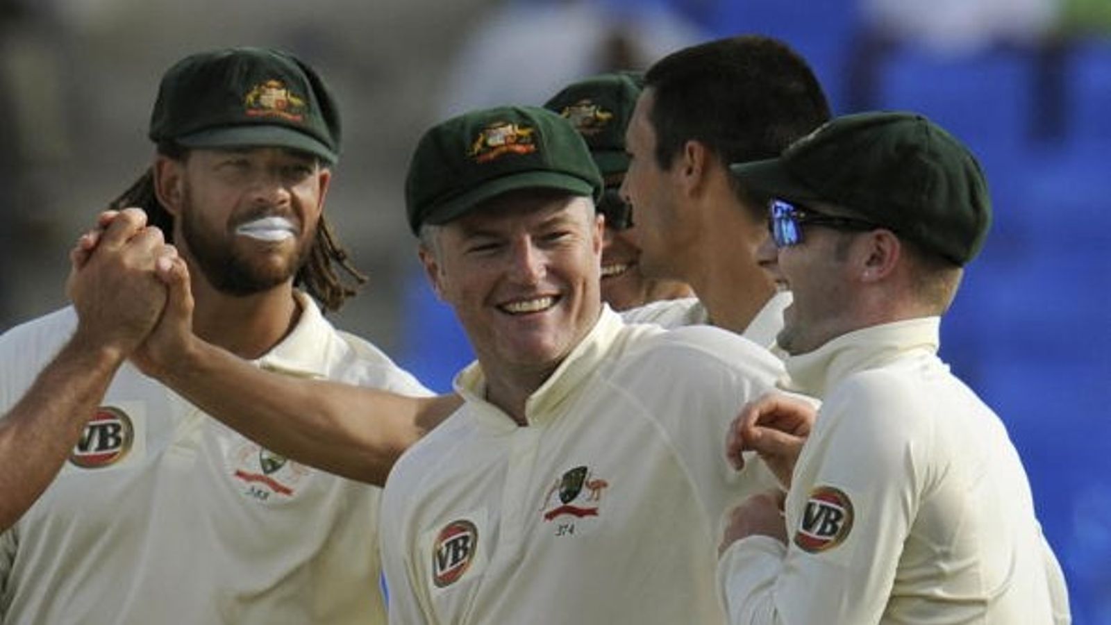 Former Australia spinner with 208 Test wickets convicted in cocaine case Stuart MacGill (C) Andrew Symonds (L) and Michael Clarke celebrate after a West Indies out during the 2008 Digicel Home Series at the Sir Vivian Richards Cricket Grounds