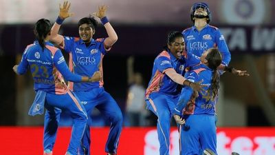 MI seal second WPL title with thrilling 8-run win over DC in final as Harmanpreet Kaur's captain's knock dampens Marizanne Kapp's all-round heroics Mumbai Indians players celebrate after winning WPL 2025 title