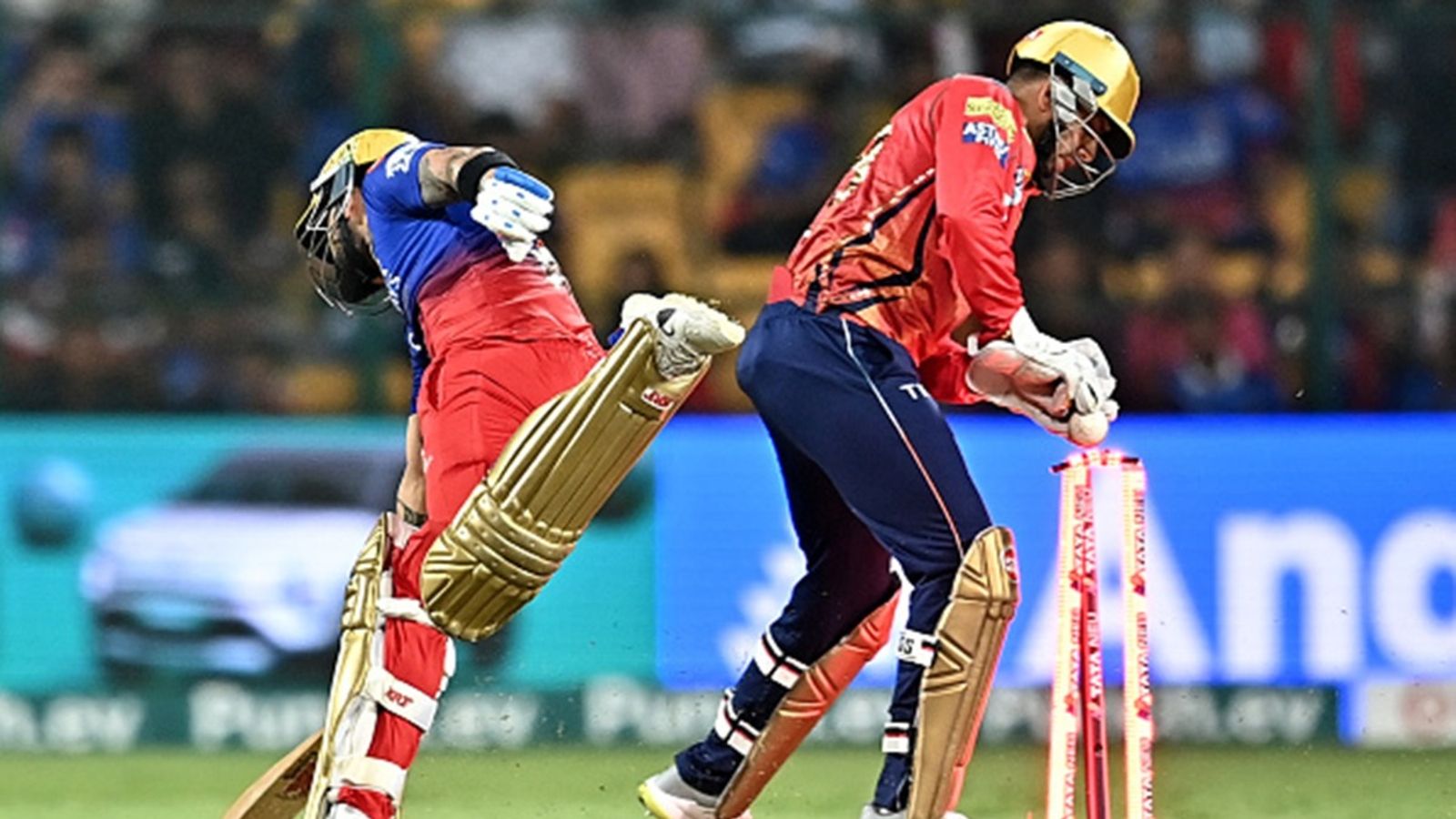 'I don't know why he didn't want to captain': Jitesh Sharma speculates the reason behind Virat Kohli declining RCB captaincy, calls Rajat Patidar 'best option' Royal Challengers Bengaluru's Virat Kohli runs between the wickets past Punjab Kings' wicketkeeper Jitesh Sharma during the Indian Premier League (IPL) 2024 at the M. Chinnaswamy Stadium in Bengaluru.